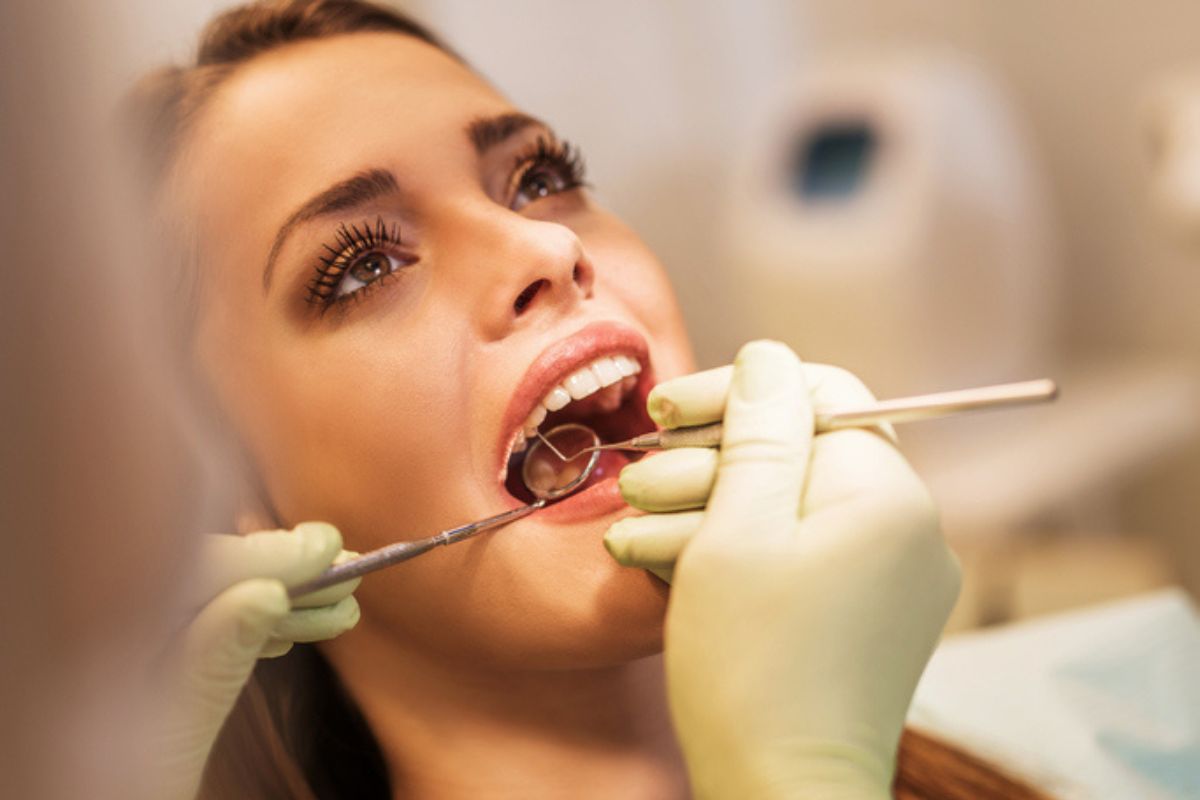 Woman getting a dental exam.